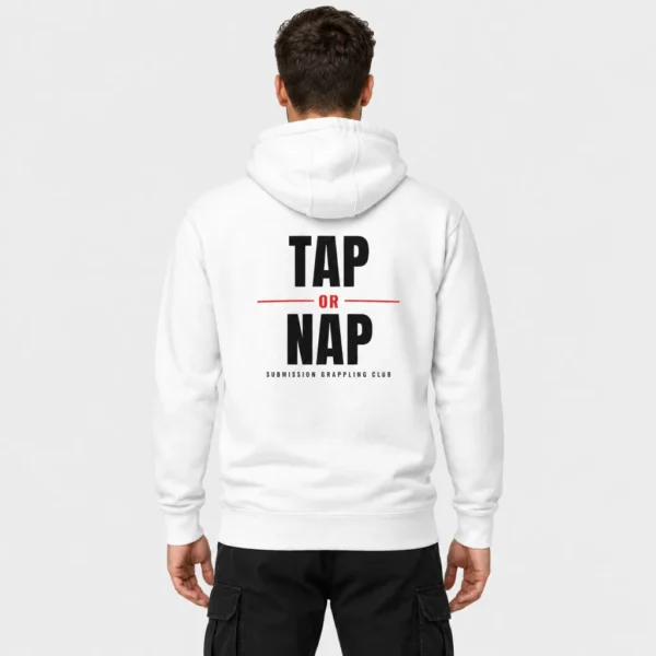 Hoodie unisexe avec l'inscription « TAP OR NAP » en lettres noires texturées imprimée dans le dos, un « OR » rouge entre deux lignes rouges et la mention « SUBMISSION GRAPPLING CLUB » en dessous. – photo studio