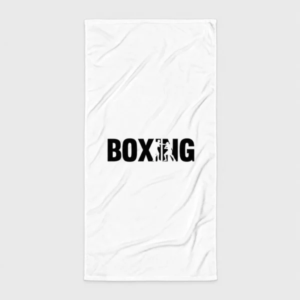 Serviette de plage blanche avec le mot « BOXING » en lettres noires, où deux silhouettes de boxeurs en plein échange se détachent en négatif. – photo studio